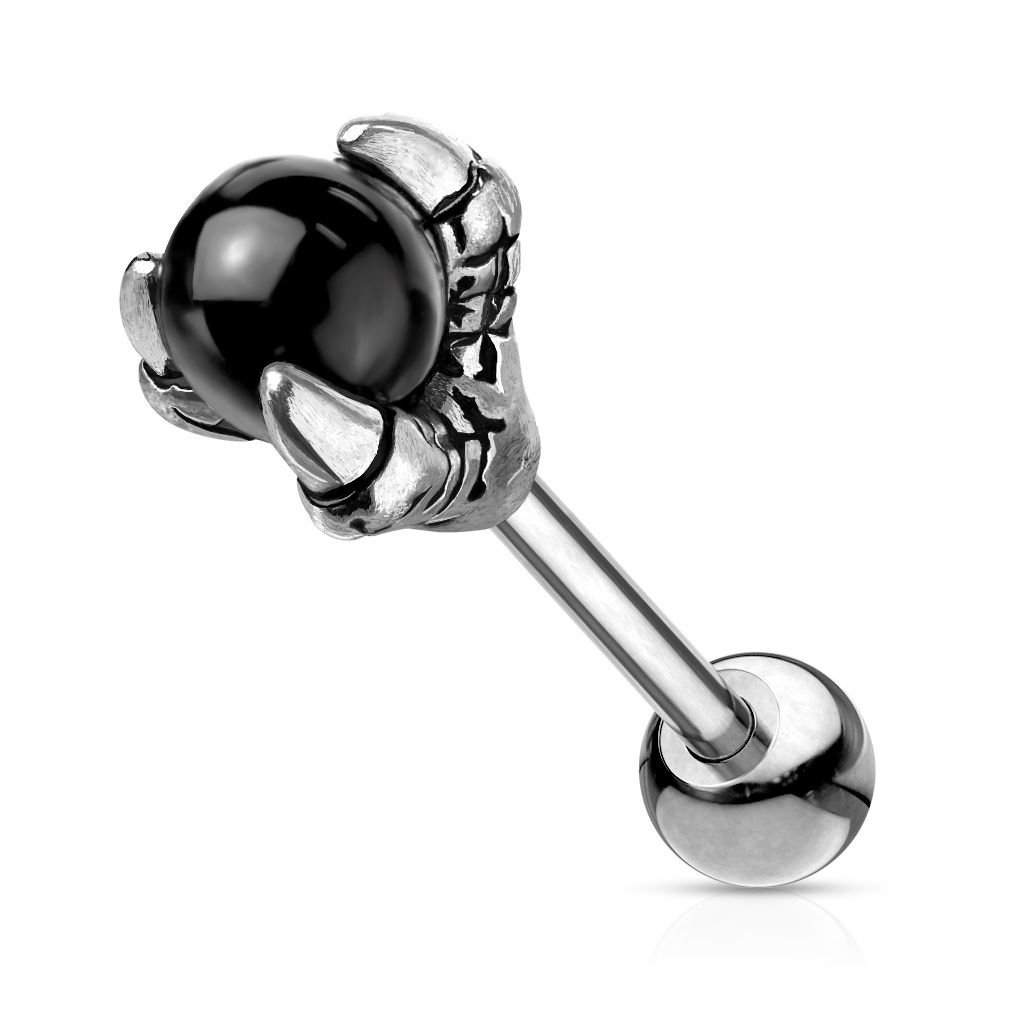 Ear piercing with black ball in dragon claw