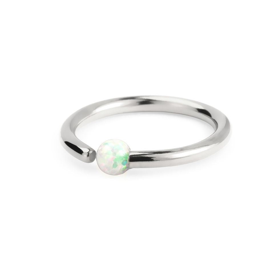 Ring with fixed opal stone