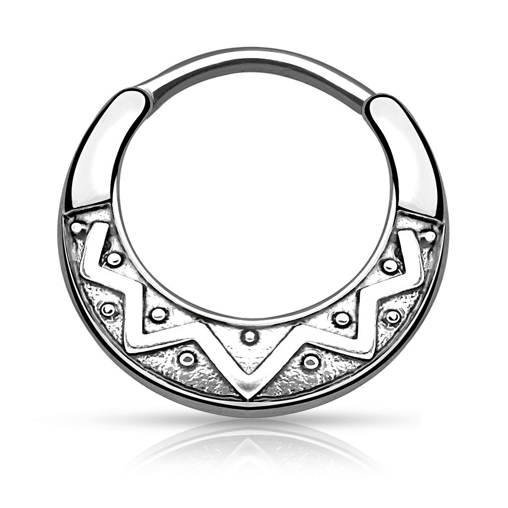 Septum clicker with aztec design