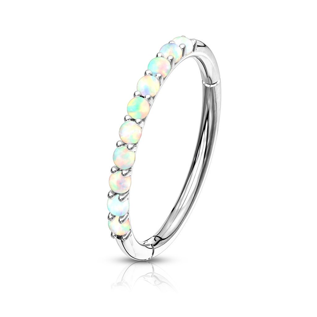 Clicker ring made of 14k gold with opalites