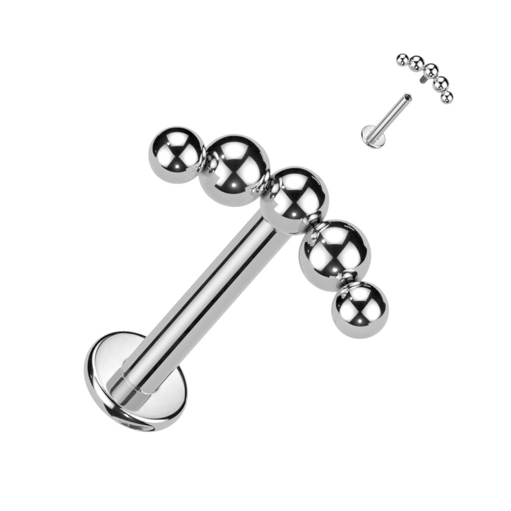 Labret od titanija ukrašen nizom kuglica