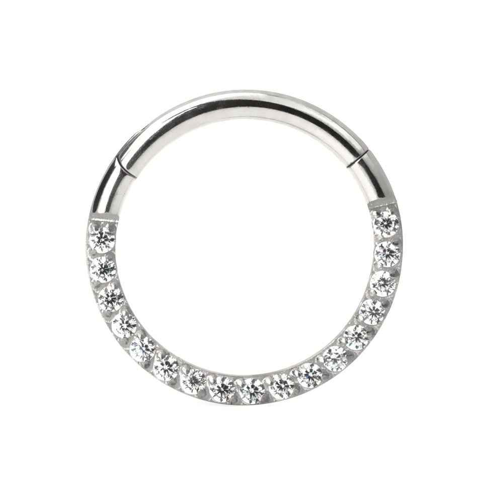 Hinged ring made of titanium with row of stones