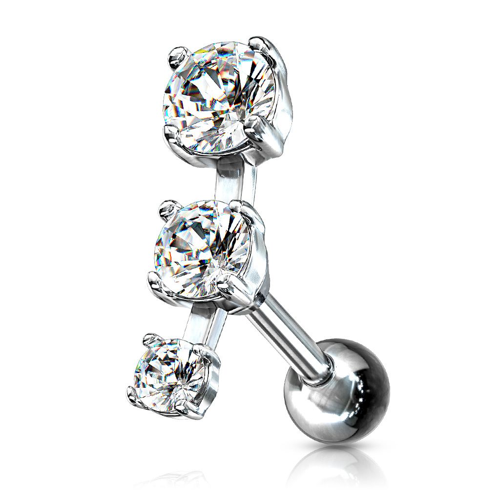 Ear piercing with three stones in a row