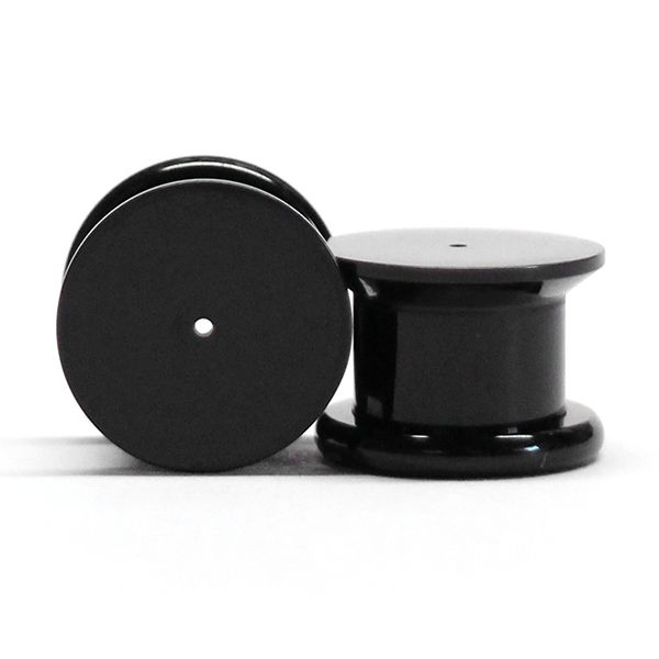 Plug made of acrylic for ear piercings.