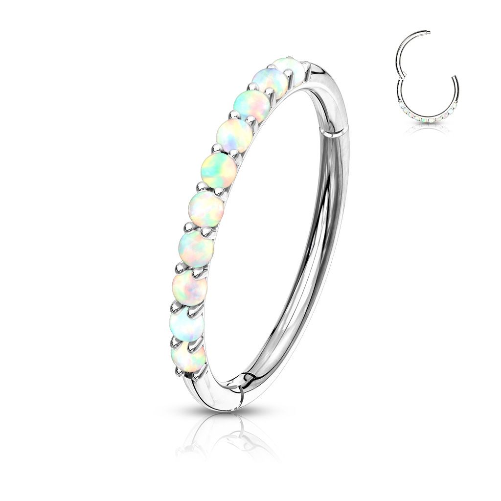 Clicker ring made of 14k gold with opalites