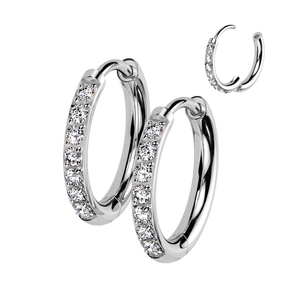 Pair of titanium huggie rings with gemstones