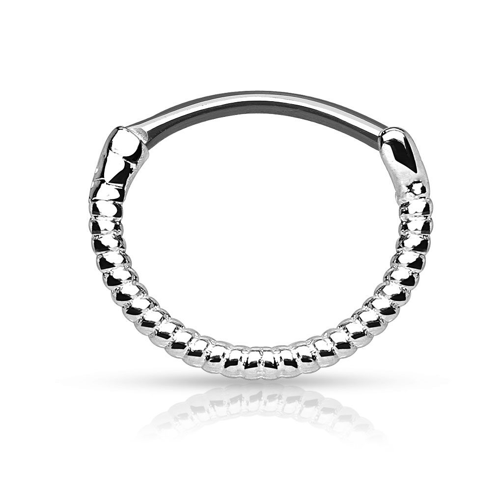 Septum clicker with twisted wire