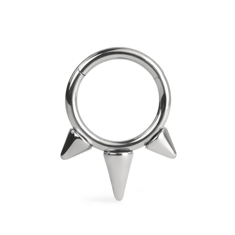Hinged ring made of titanium with spikes