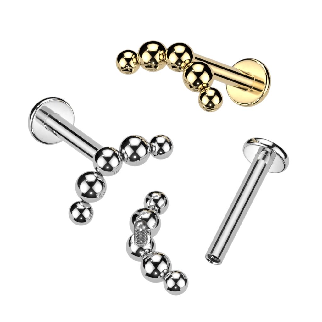 Labret od titanija ukrašen nizom kuglica
