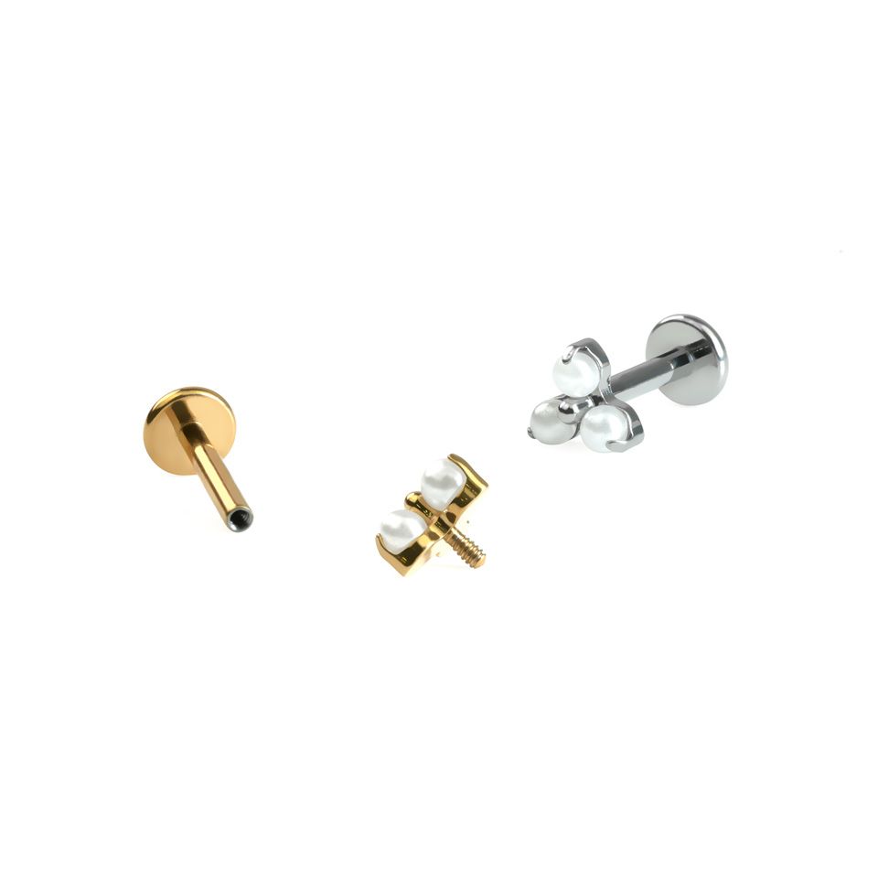 Delicate titanium labret with trio of pearls
