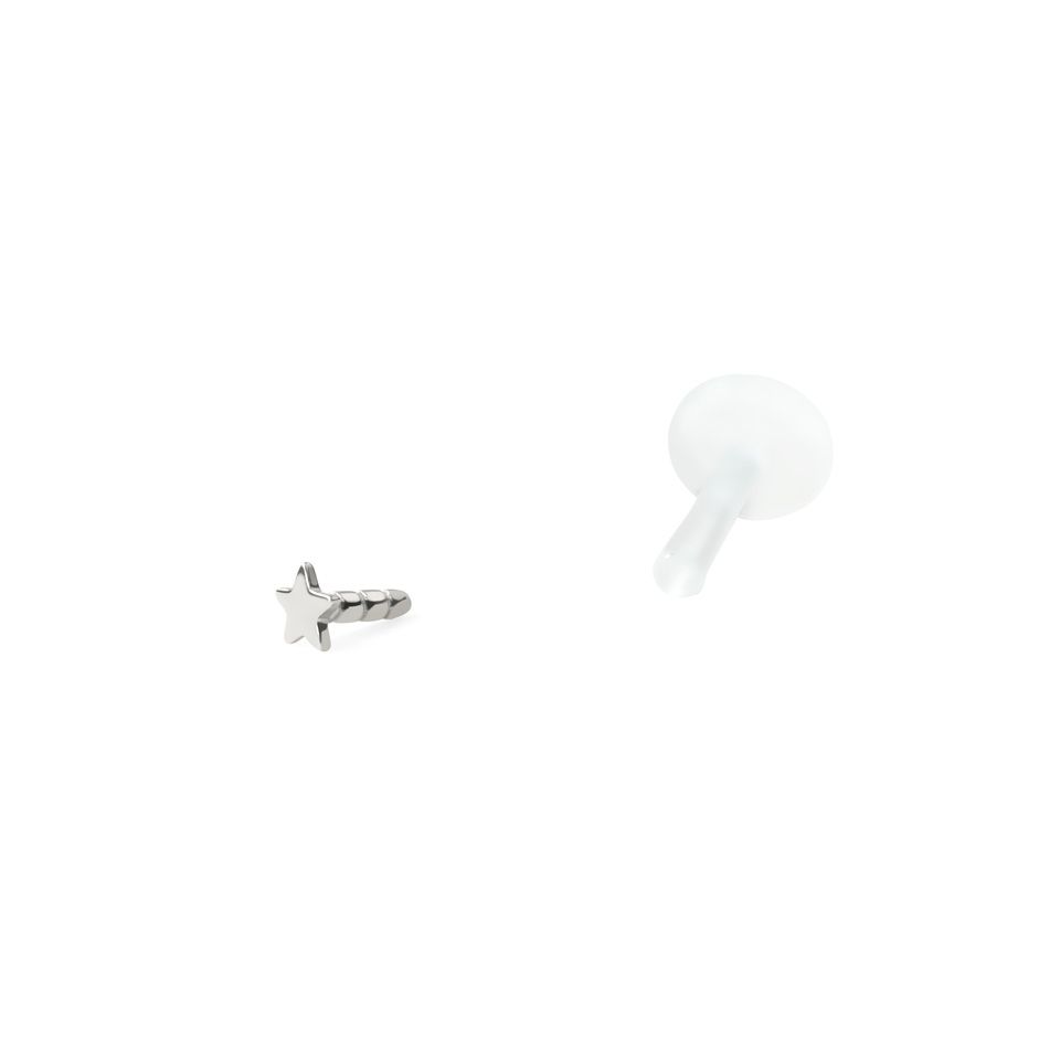 Labret with top star made of 14k gold