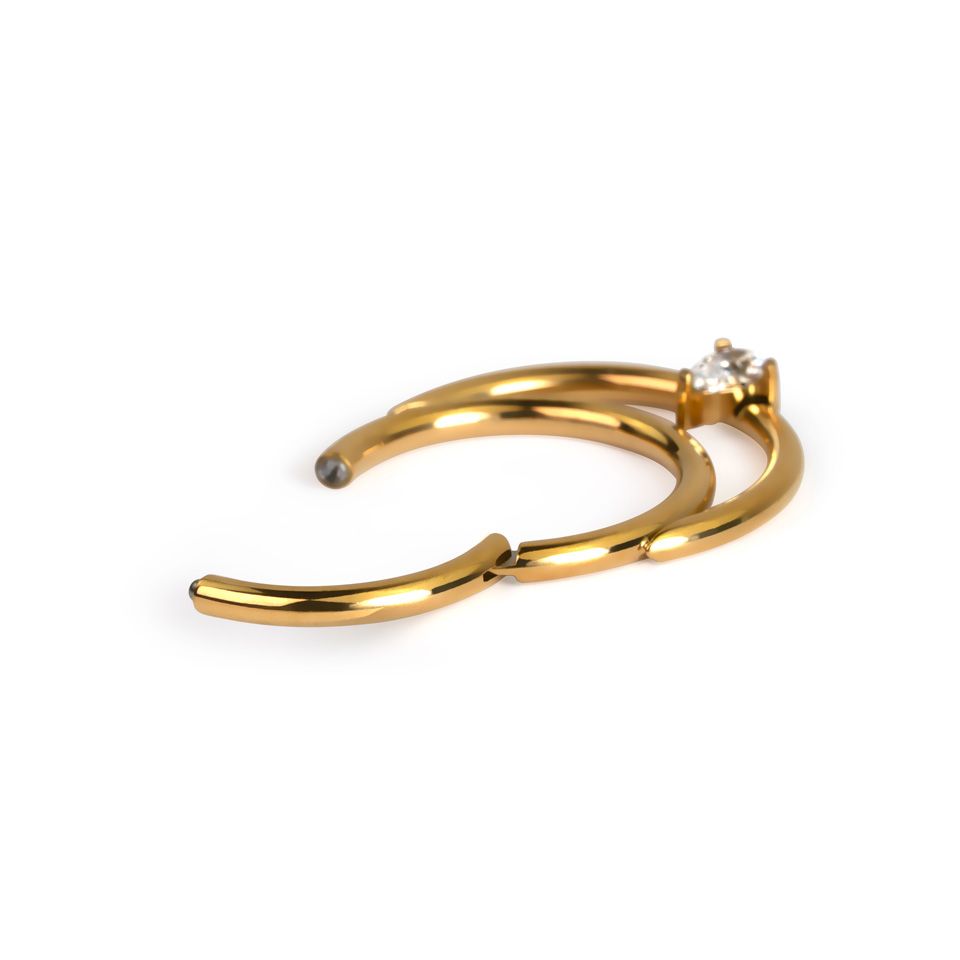 Titanium hinged ring with double hoop and teardrop stone