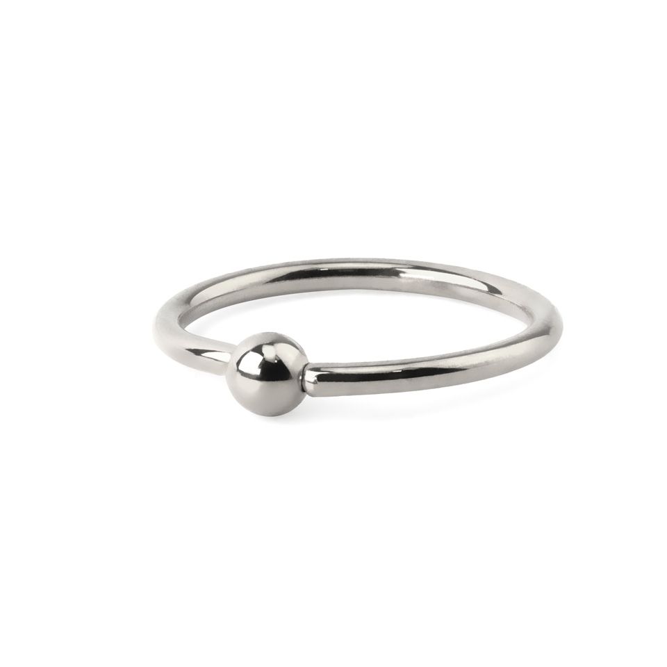Ring made of titanium with fixed ball