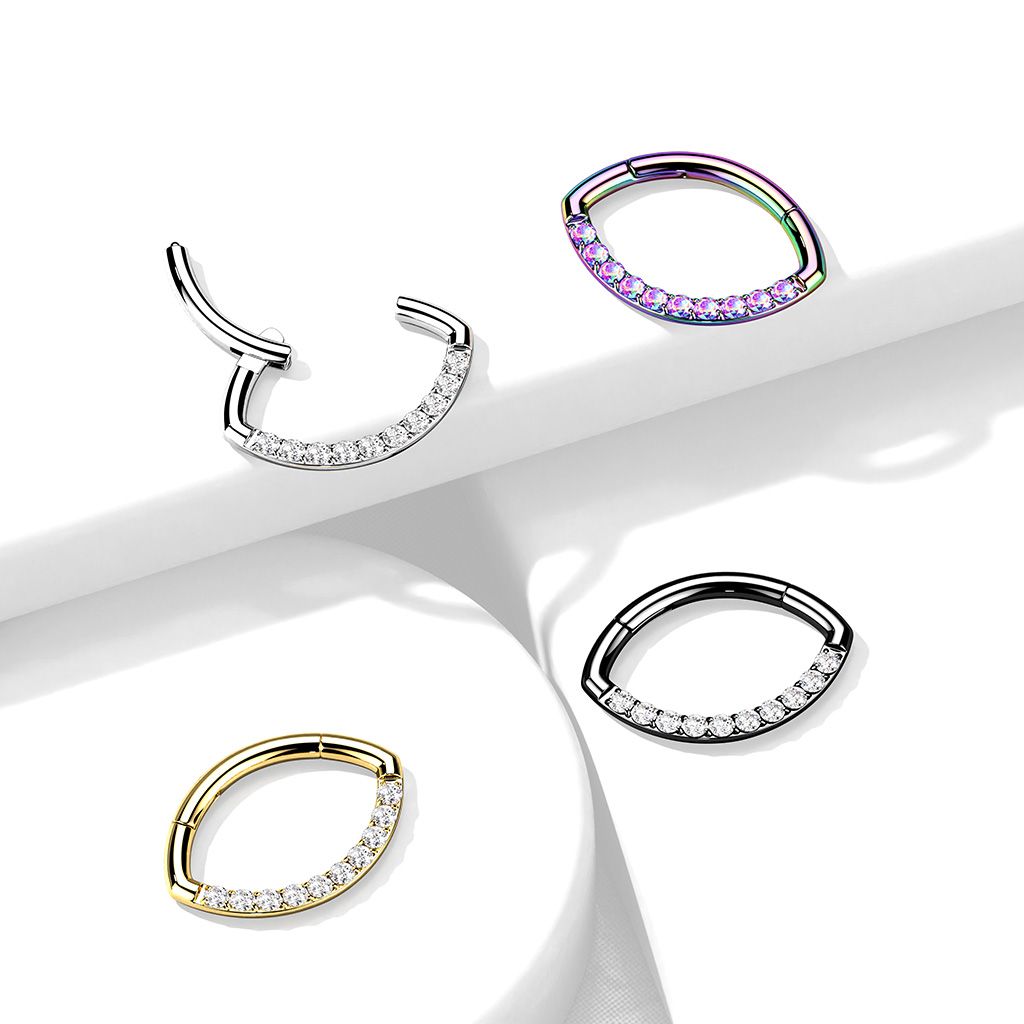 Hinged ring with oval shape and row of stones