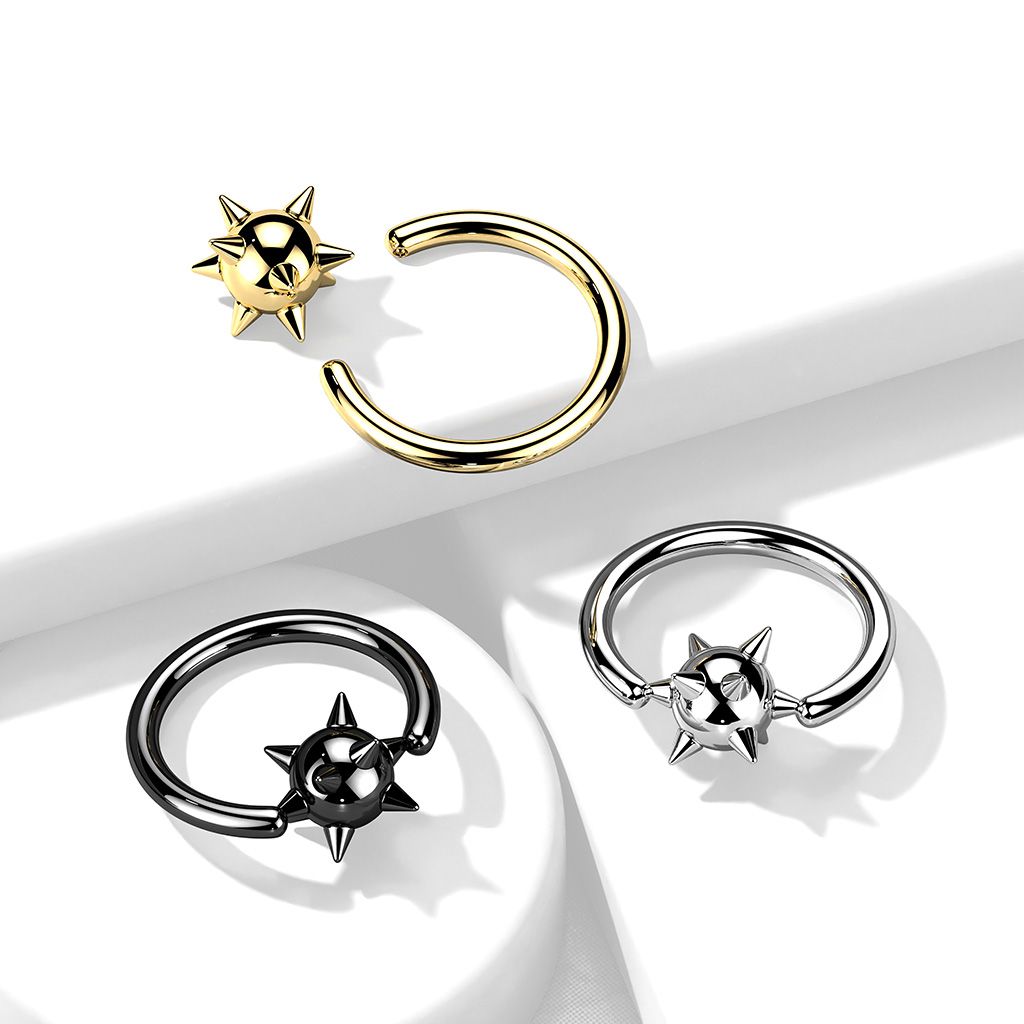 Captive bead ring with spiked ball