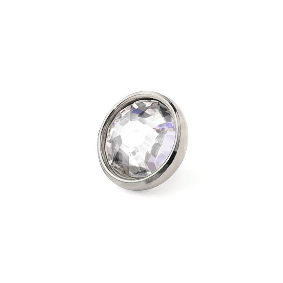 Dermal top jewelry made of titanium with colored stone