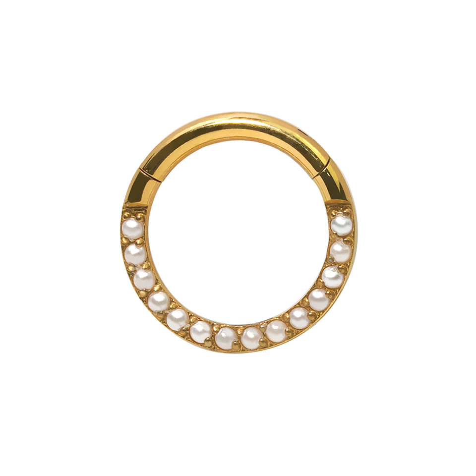 Titanium ring with forward facing pearls