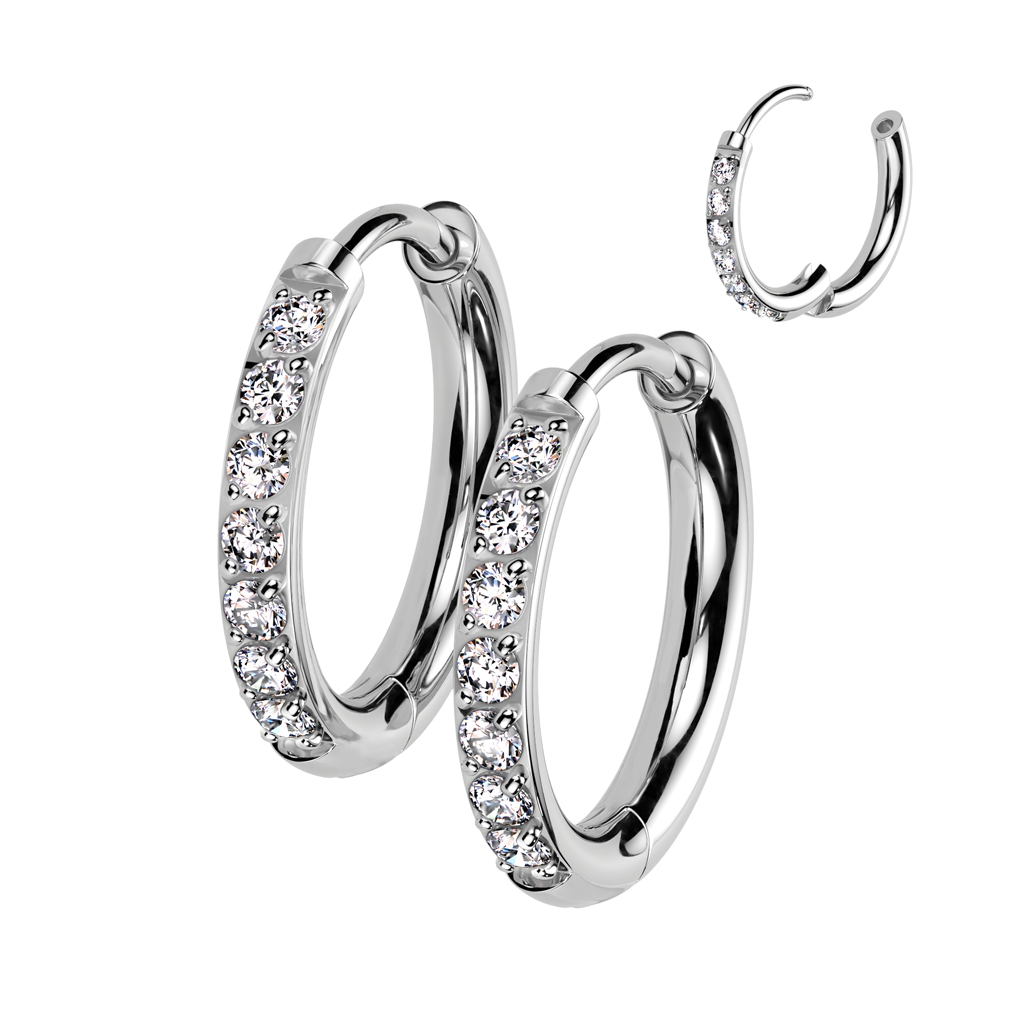Pair of titanium huggie rings with gemstones