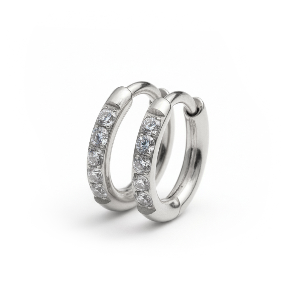 Pair of titanium huggie rings with gemstones