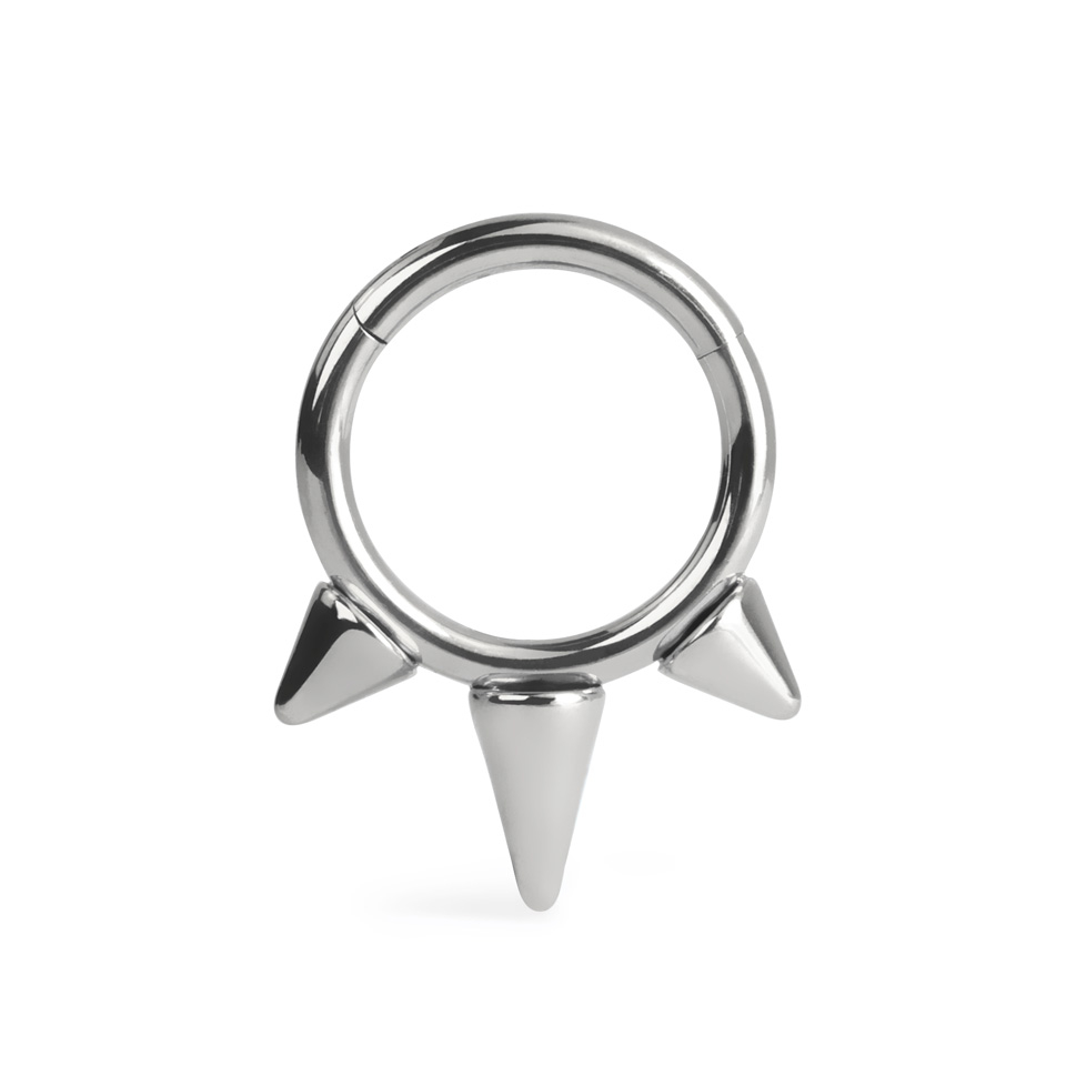 Hinged ring made of titanium with spikes