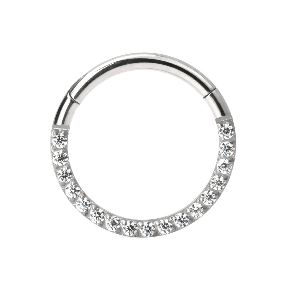 Hinged ring made of titanium with row of stones