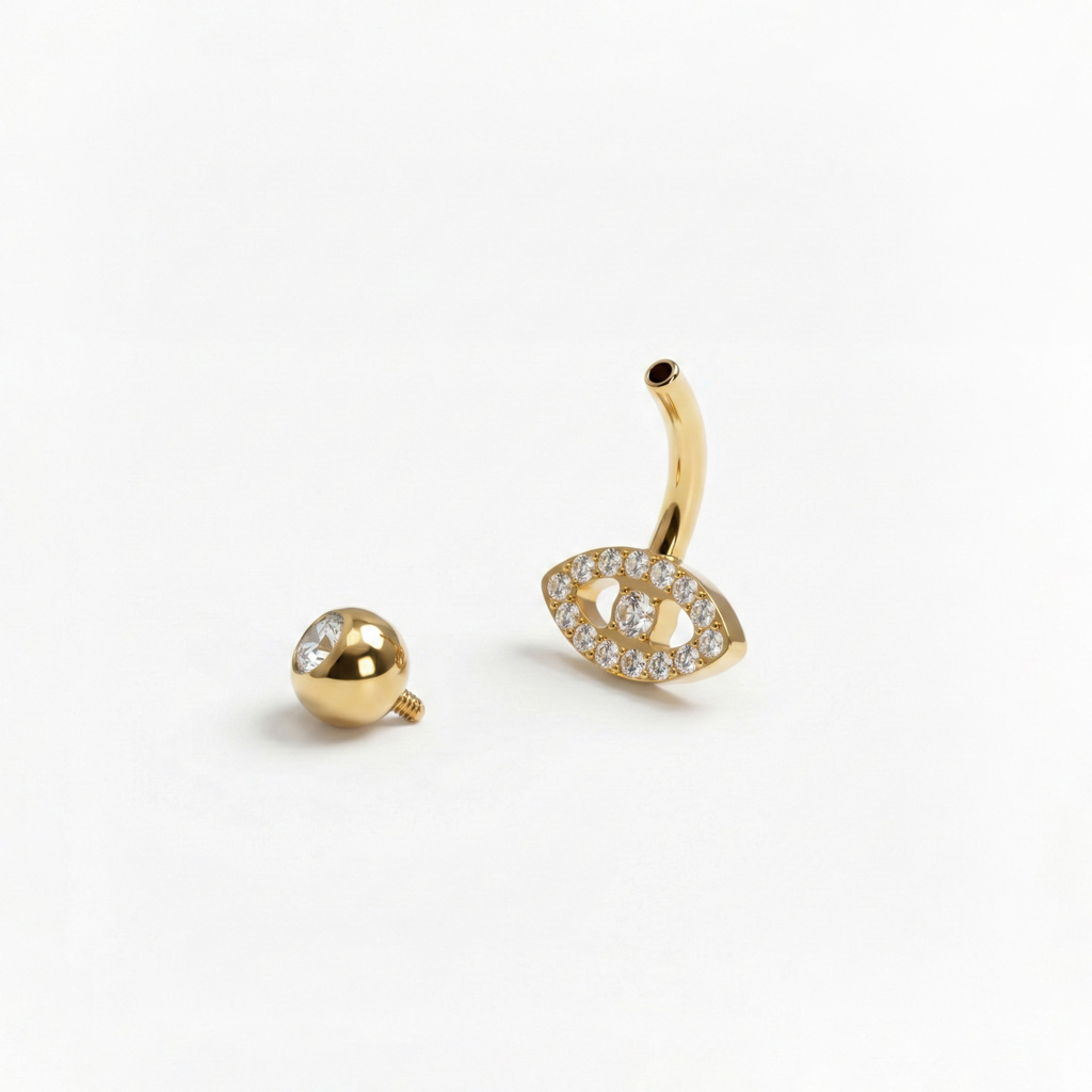 Titanium belly ring with evil eye