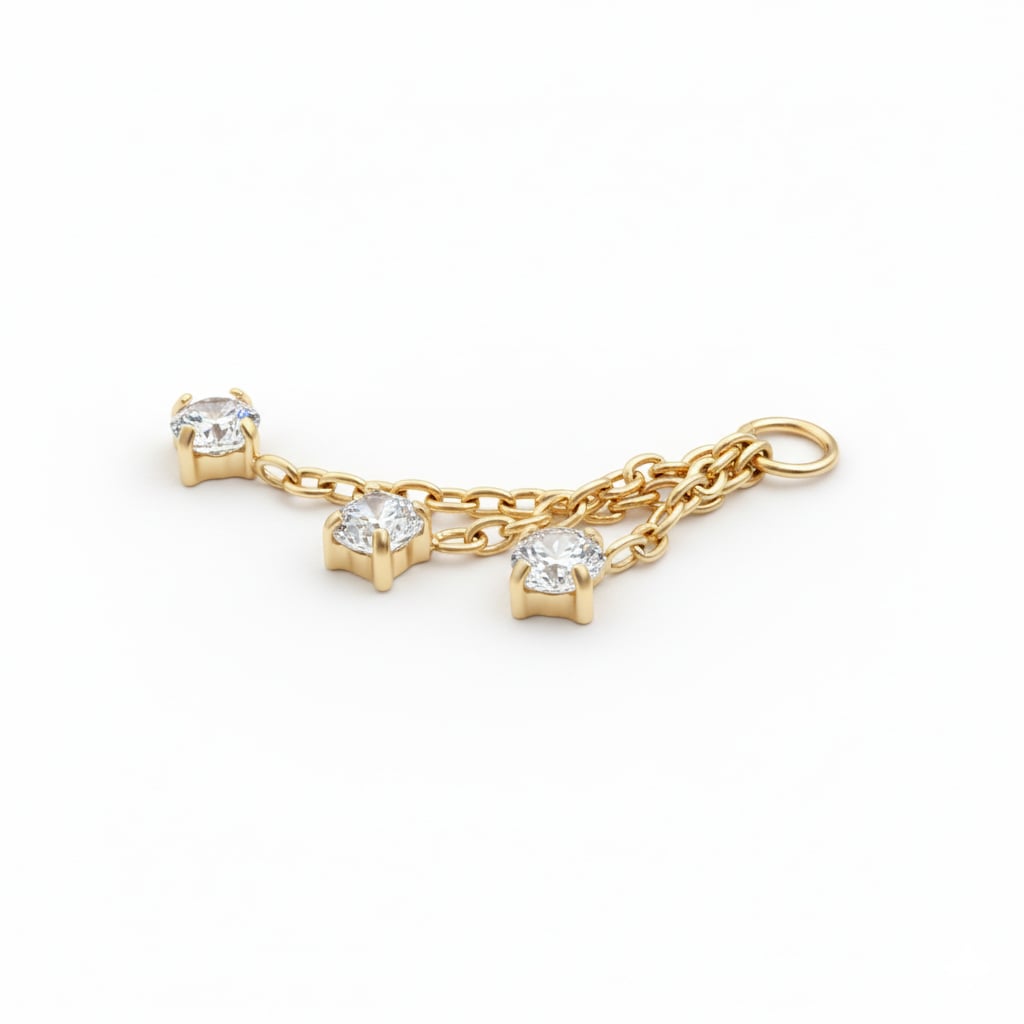 Charm with trio of stones