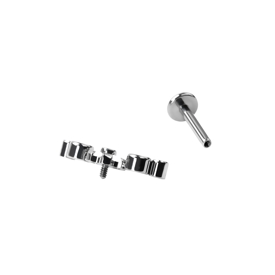 Titanium labret with central flower and CZ stones