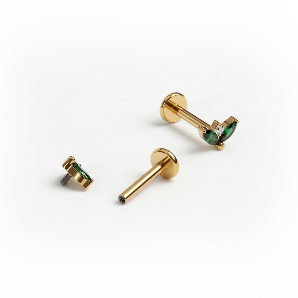 Labret od titanija s dva smaragdno-zelena kamenčića