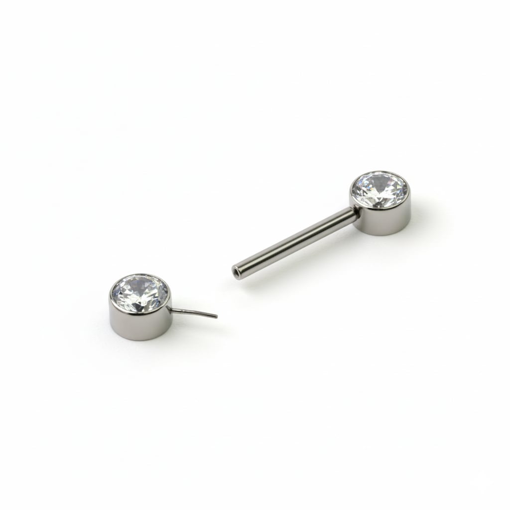 Nipple barbell made of titanium with threadless push-in bezel set stones