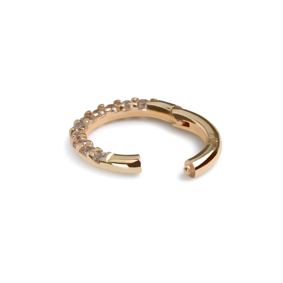 Clicker ring made of solid 14k gold with zirconia channel