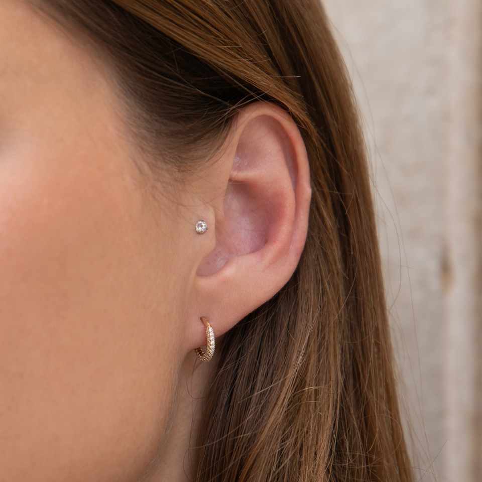 14K gold hinged ring with round CZ paved edge