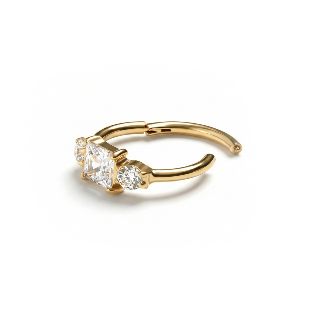 Titanium hinged ring with three CZ stones