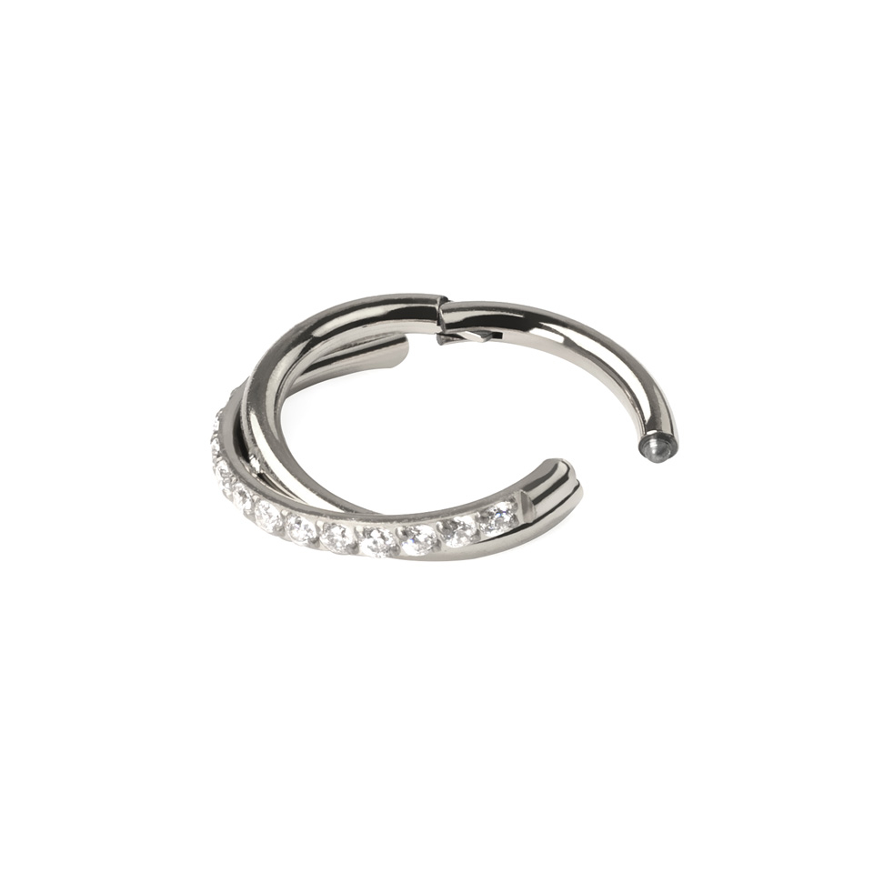 Hinged segment ring with stone-paved crossover arch